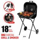 Black BBQ charcoal grill and smoker with food on a white background