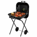 Black portable grill with food on a white background